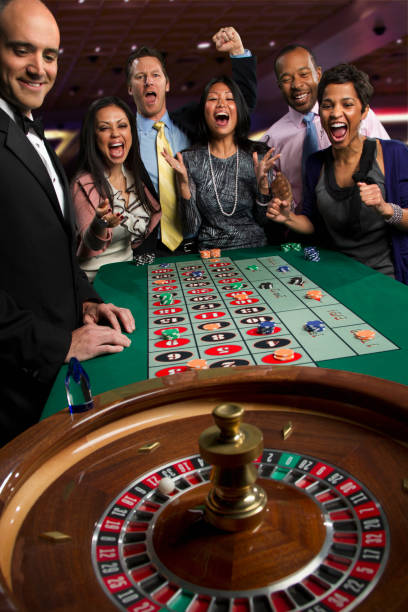 Multi-camera live studio showing roulette table and dealer broadcast from olx69